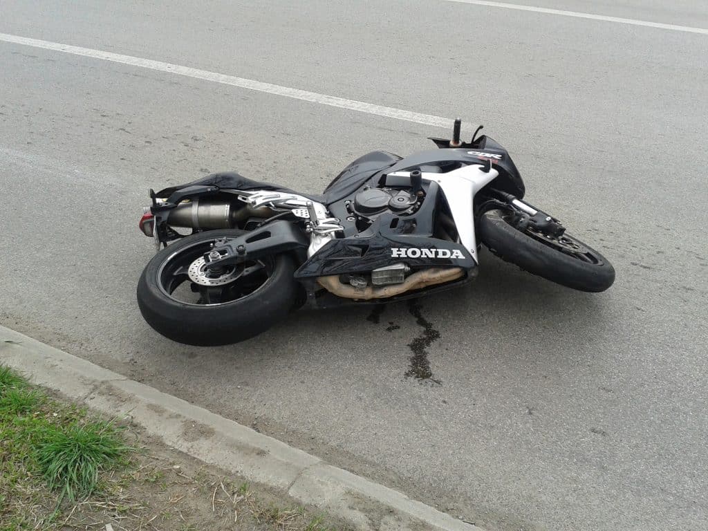 Who is responsible for paying after a motorcycle accident